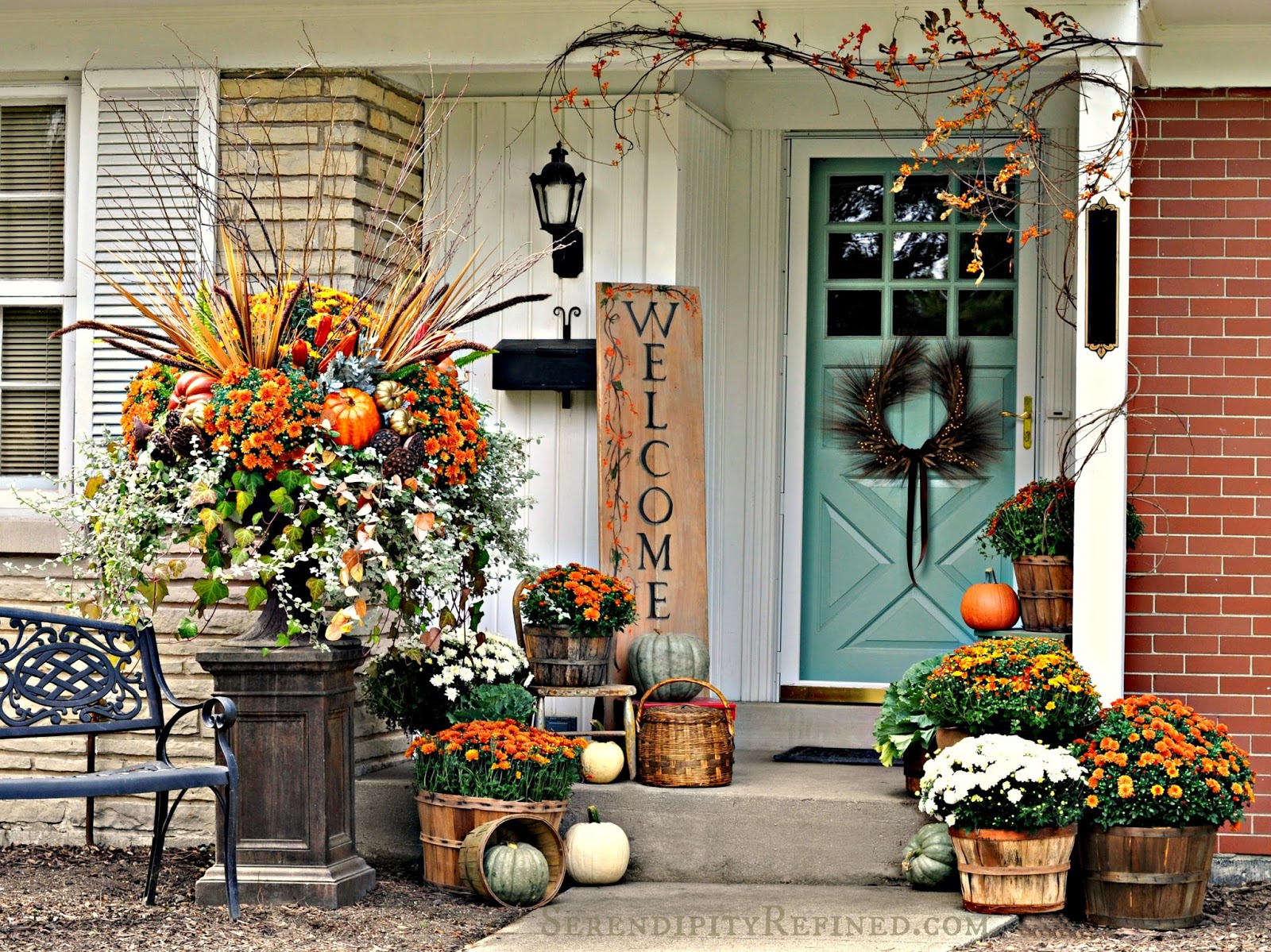 Fall-porch-outdoor-decorating-idea-simple-harvest-baskets-pumpkins-mums-bittersweet